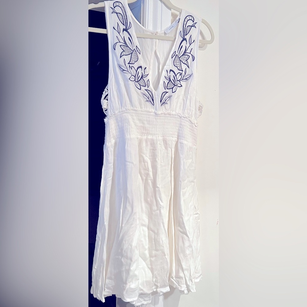 Lush Rayon sundress with embroidery on front and lined bottom.
